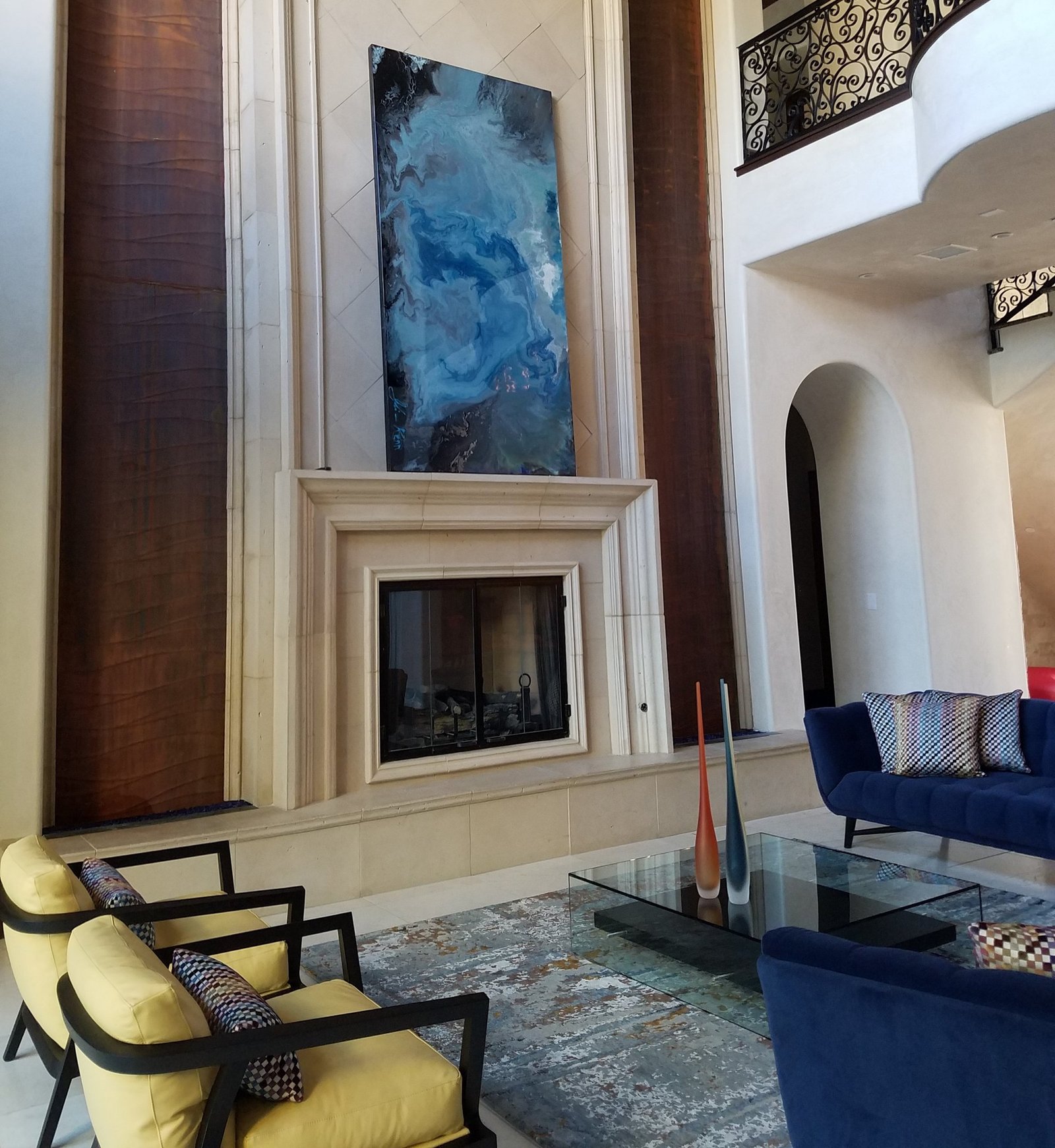 Art - Infinate Waters by Joline Renn and 8x4 resin piece -walls are venetian plaster in off white